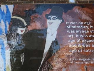 Jazz Age mural on brick wall.