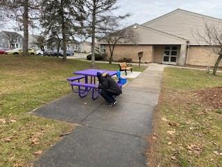 Installing new picnic table.