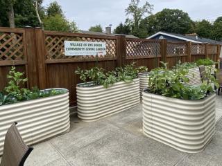 Completed community garden with sign.